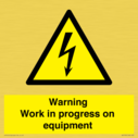 warning-work-in-progress-on-equipmentwith-electrical-hazard-symbol~